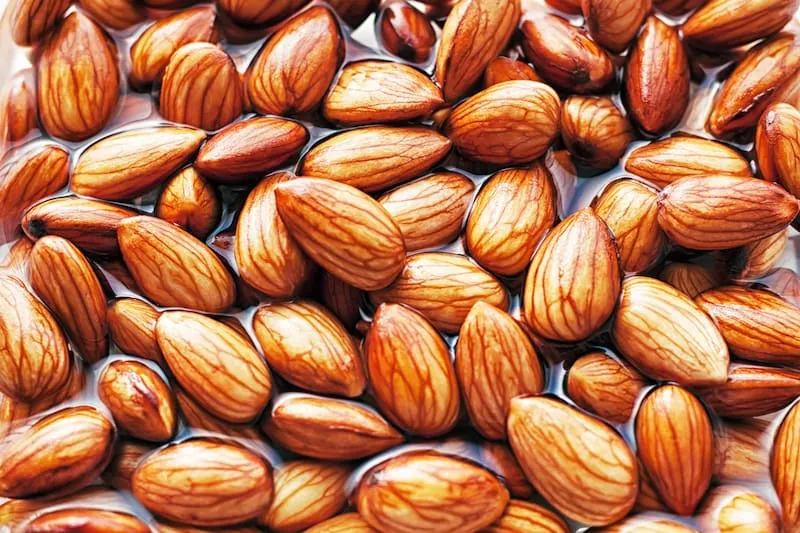 قیمت خرید مغز بادام پوست کاغذی + خواص، معایب و مزایا